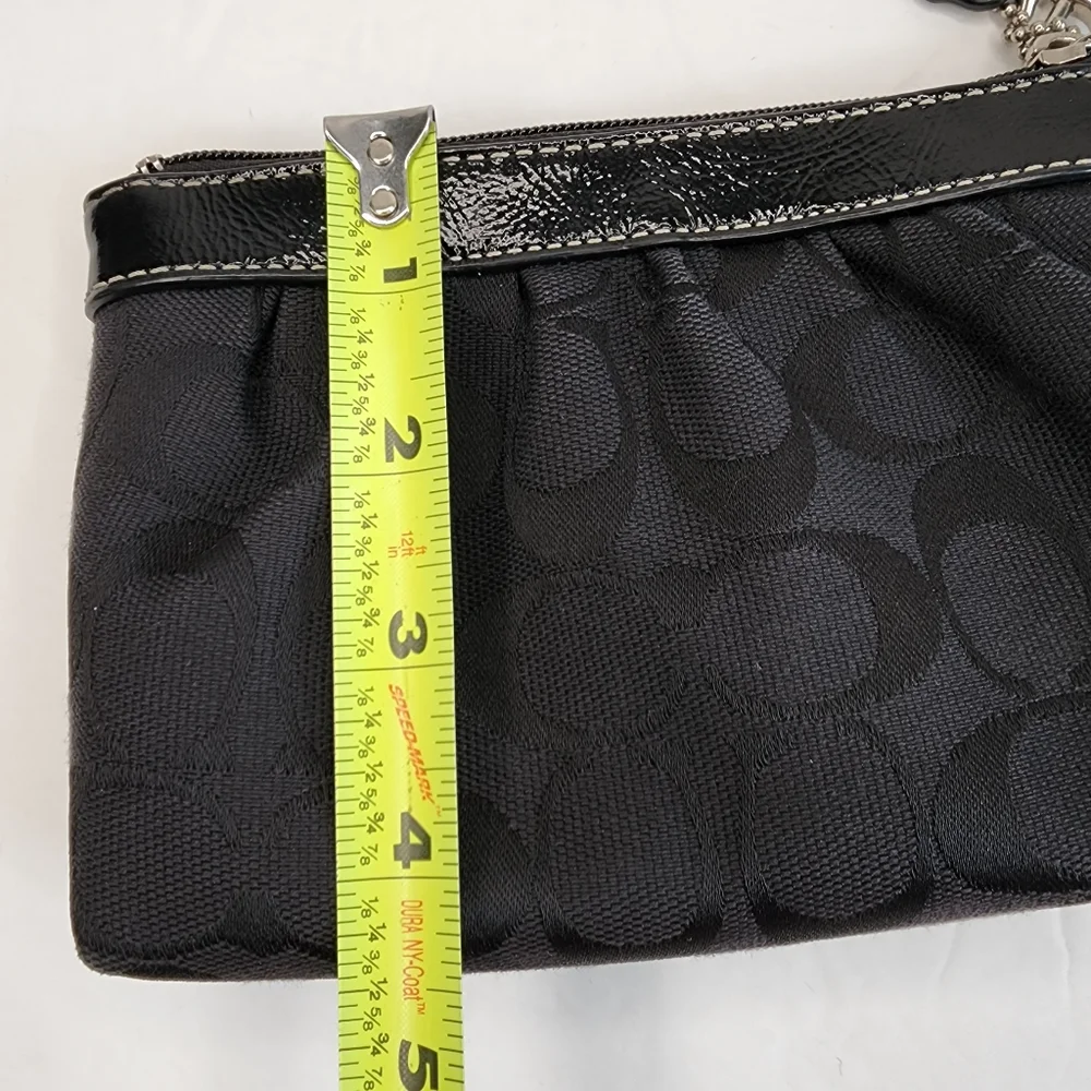 Coach wristlet signature